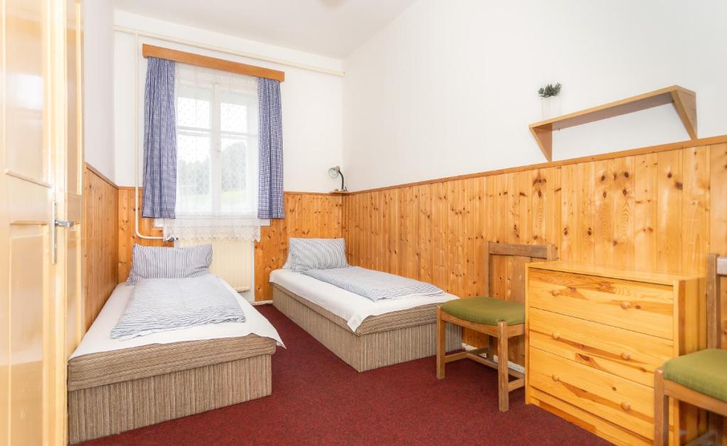 Postel nebo postele na pokoji v ubytování Chata Luna