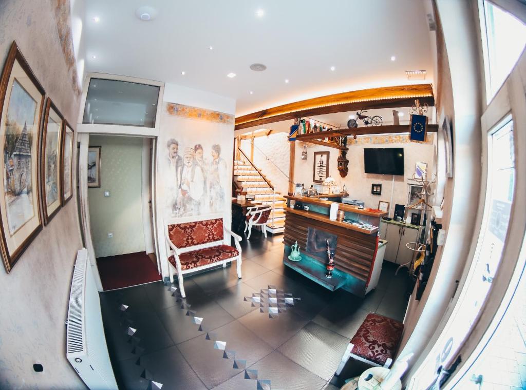 an overhead view of a living room with a staircase at Hotel Lula in Sarajevo