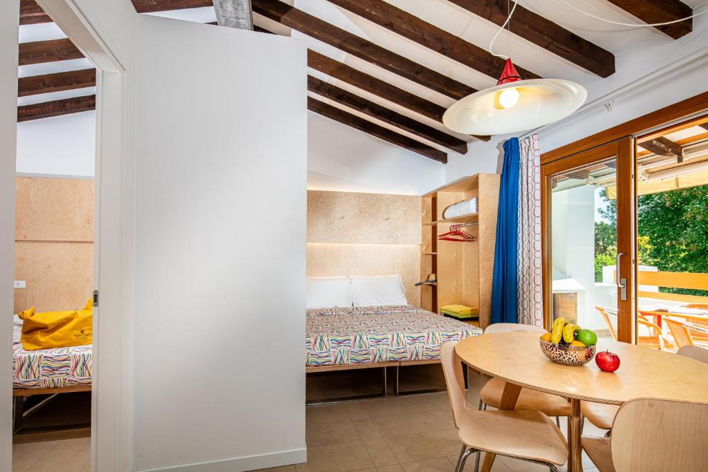 Postel nebo postele na pokoji v ubytování Villaggio Los Nidos