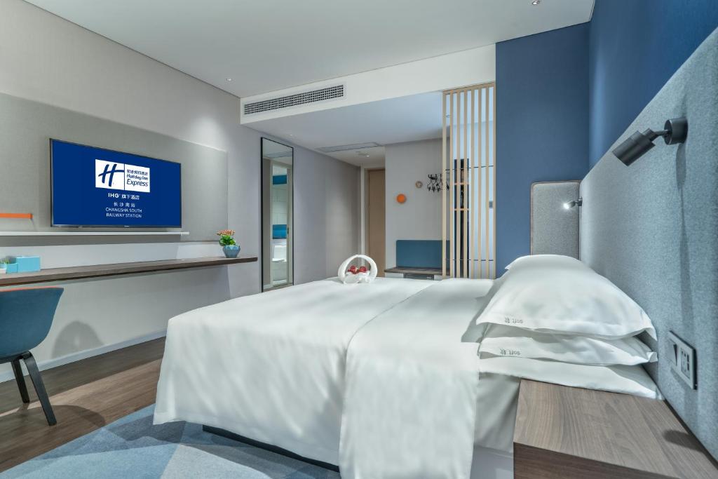Holiday Inn Express Changsha South Railway Station by IHGにあるベッド