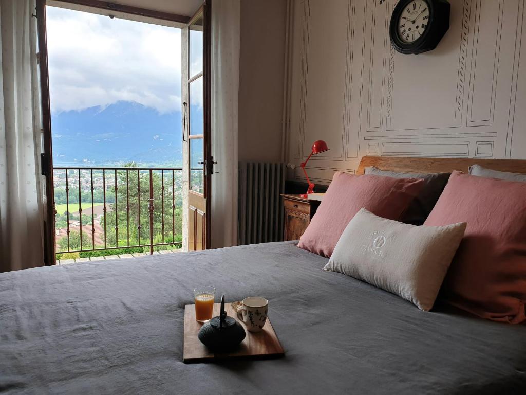 Postel nebo postele na pokoji v ubytování Les Ô d'Annecy