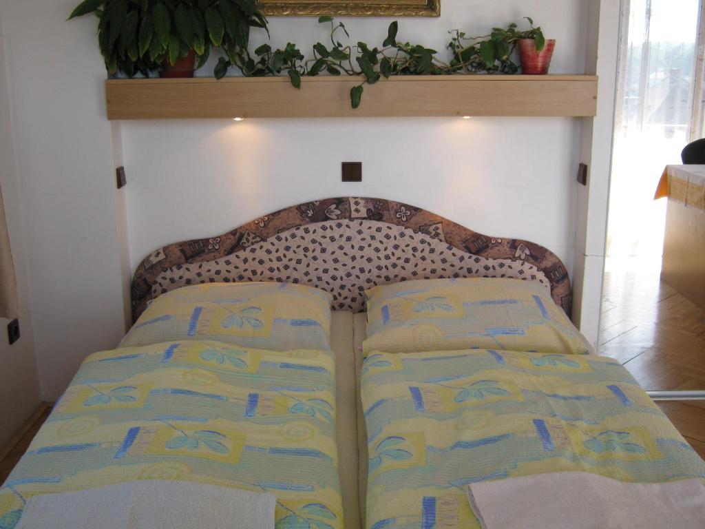 Postel nebo postele na pokoji v ubytování Privat Apartma Ulrych