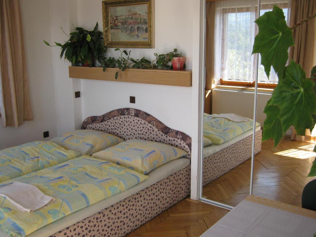 Postel nebo postele na pokoji v ubytování Privat Apartma Ulrych