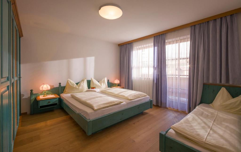 Postel nebo postele na pokoji v ubytování Appartement Fuchs Ferdinand