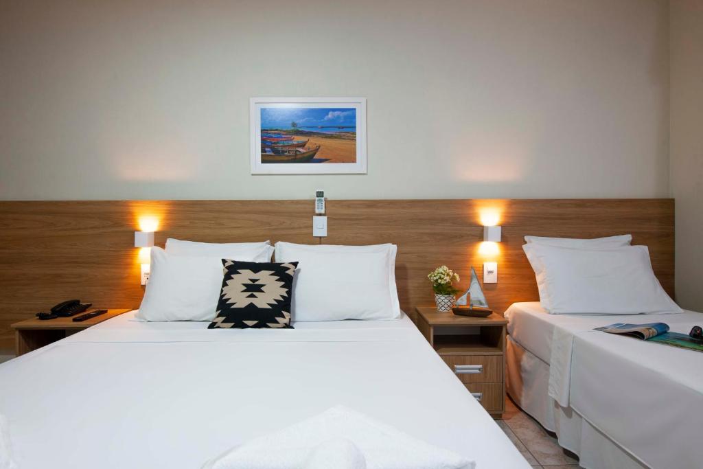 Postel nebo postele na pokoji v ubytování Hotel Portal da Lua