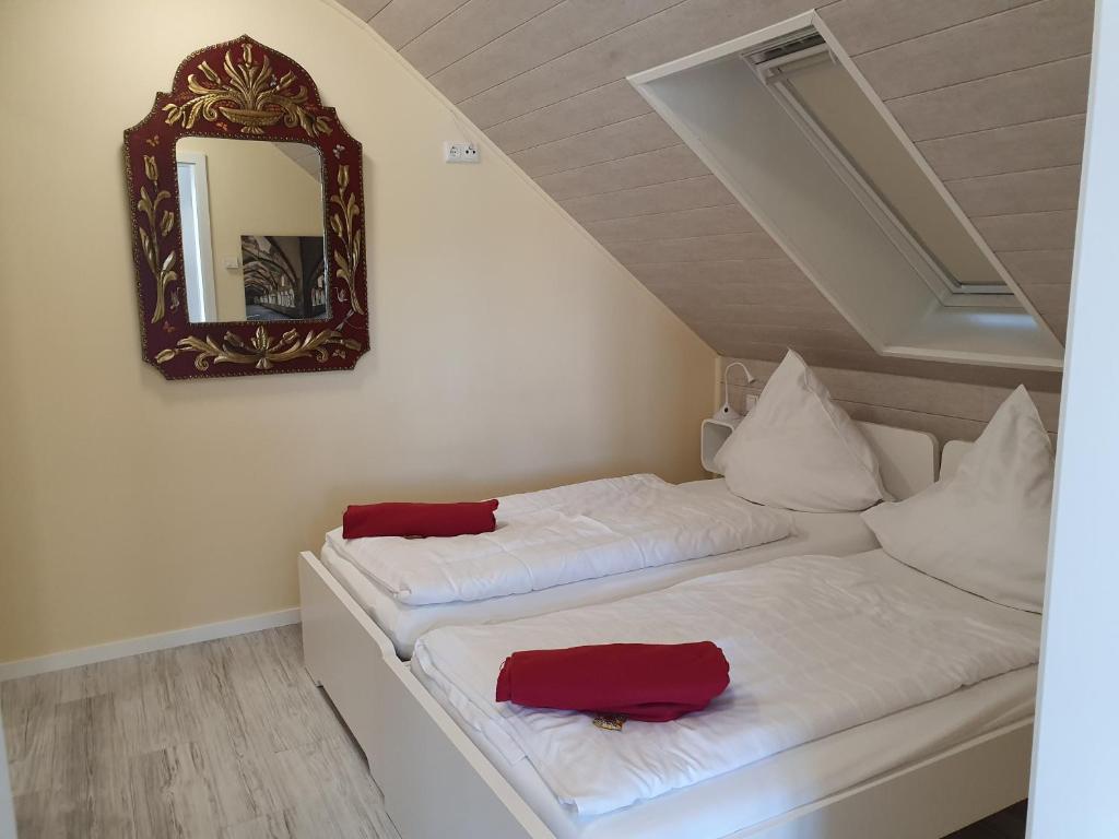 Postel nebo postele na pokoji v ubytování Apartmenthaus in Walle