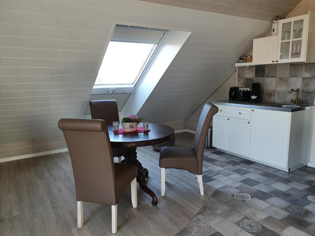 Kuchyň nebo kuchyňský kout v ubytování Apartmenthaus in Walle