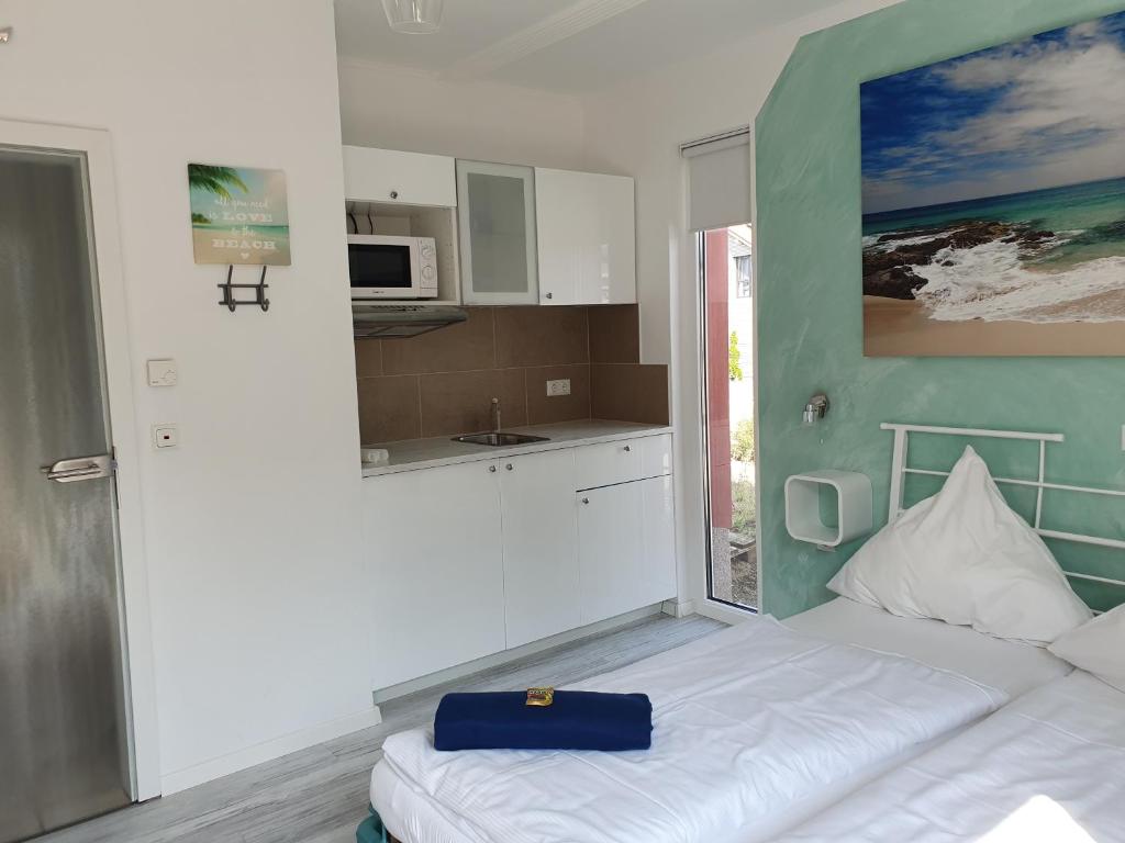 Kuchyň nebo kuchyňský kout v ubytování Apartmenthaus in Walle