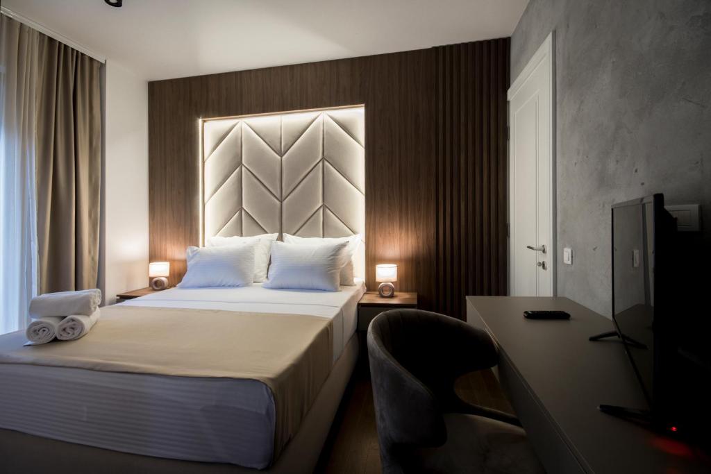 Postel nebo postele na pokoji v ubytování Hotel LoRa