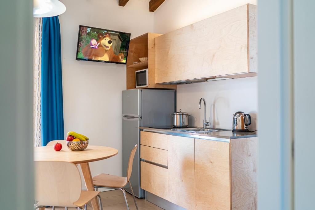 Kuchyň nebo kuchyňský kout v ubytování Villaggio Los Nidos