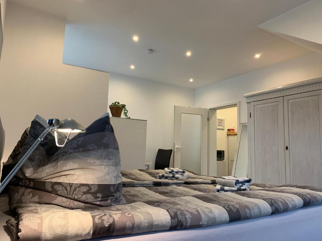 
Ein Bett oder Betten in einem Zimmer der Unterkunft H&E Apartments
