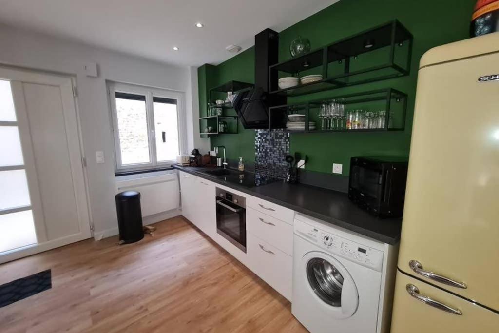 Kuchyň nebo kuchyňský kout v ubytování La Paulée à Pommard