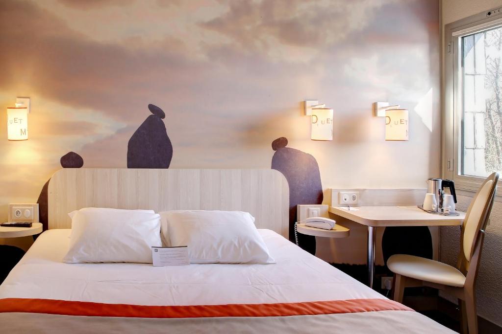 Postel nebo postele na pokoji v ubytování Best Western Auray le Loch