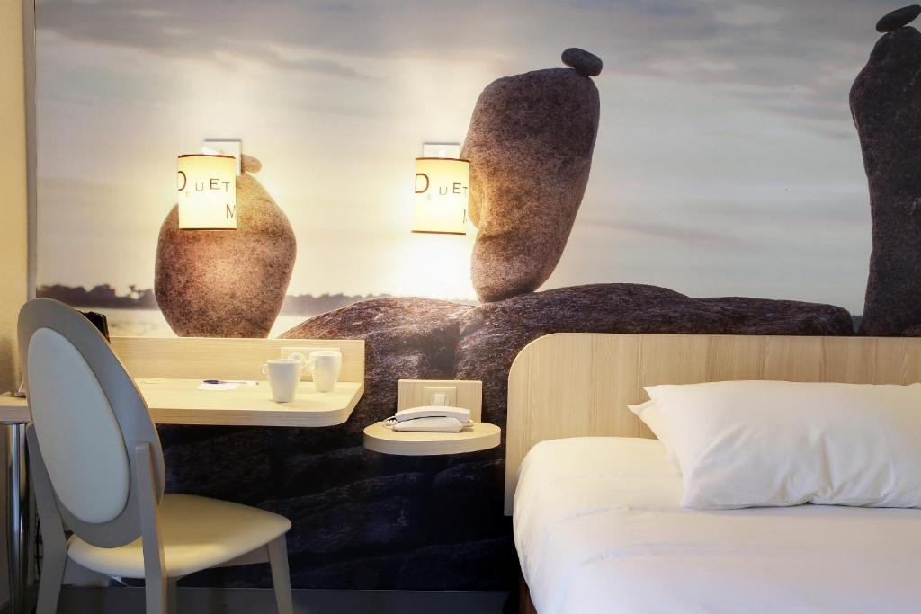 Postel nebo postele na pokoji v ubytování Best Western Auray le Loch