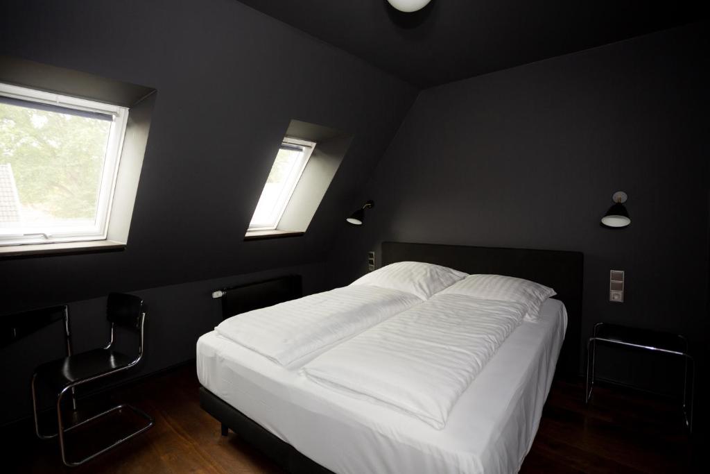 Postel nebo postele na pokoji v ubytování Hotel Hansenhof