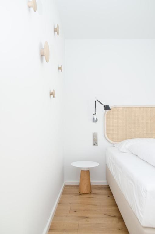 Postel nebo postele na pokoji v ubytování Hotel Hansenhof