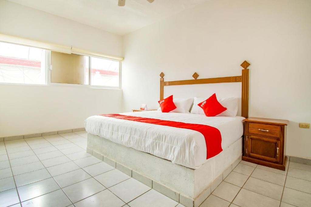 Krevet ili kreveti u jedinici u okviru objekta OYO Hotel Morelos, Villa Hidalgo