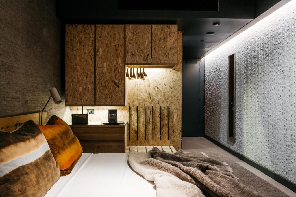 Кровать или кровати в номере Ovolo Nishi