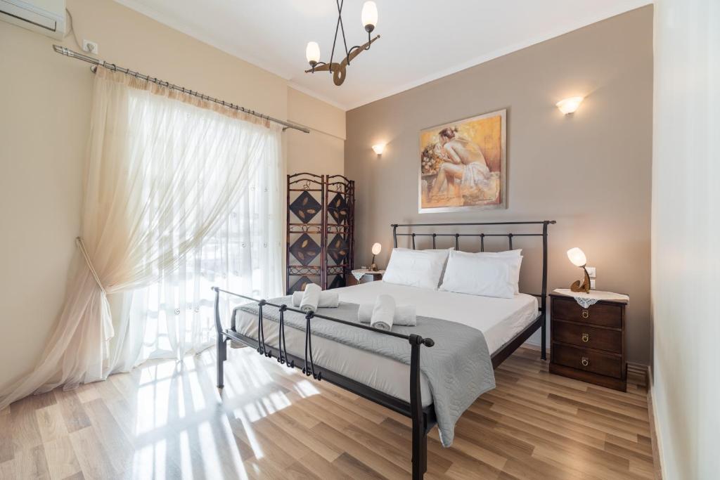 Ένα ή περισσότερα κρεβάτια σε δωμάτιο στο Castellano Monemvasia