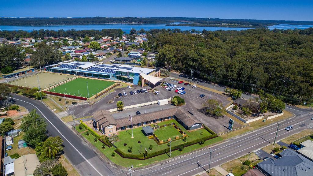 an aerial view of a building with a tennis court at Lemon Tree Passage Motel in Lemon Tree Passage