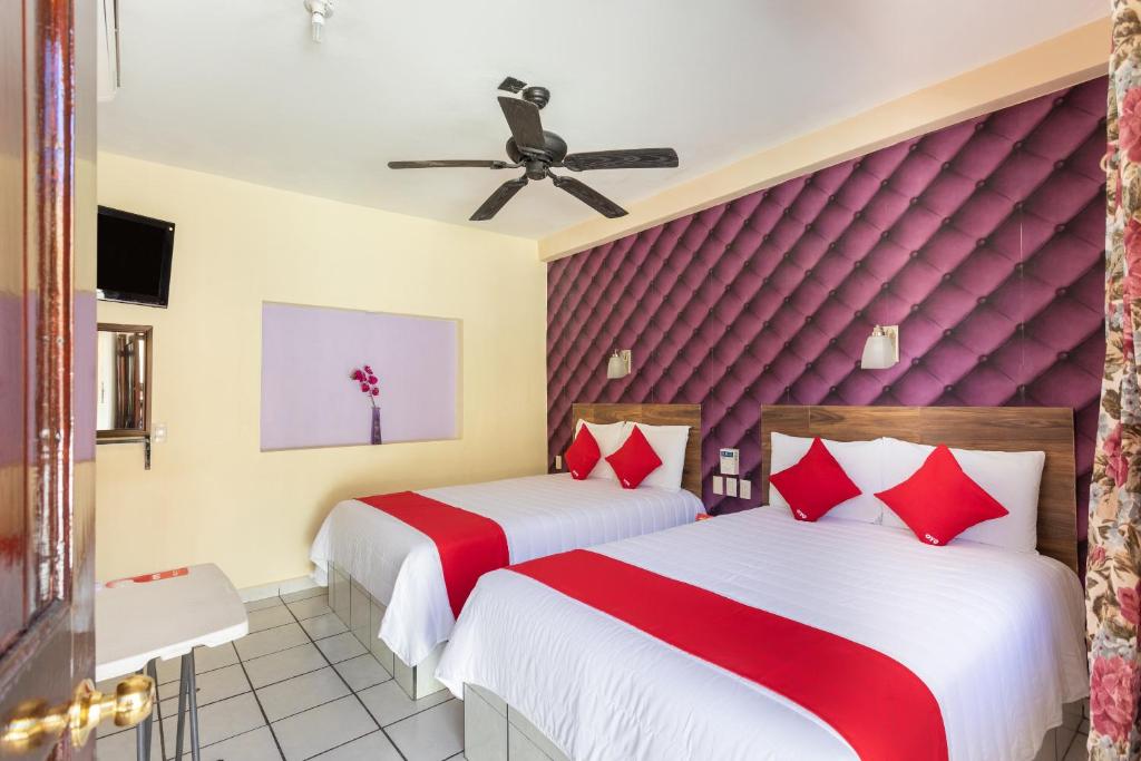 Postel nebo postele na pokoji v ubytování Hotel Costa Azul