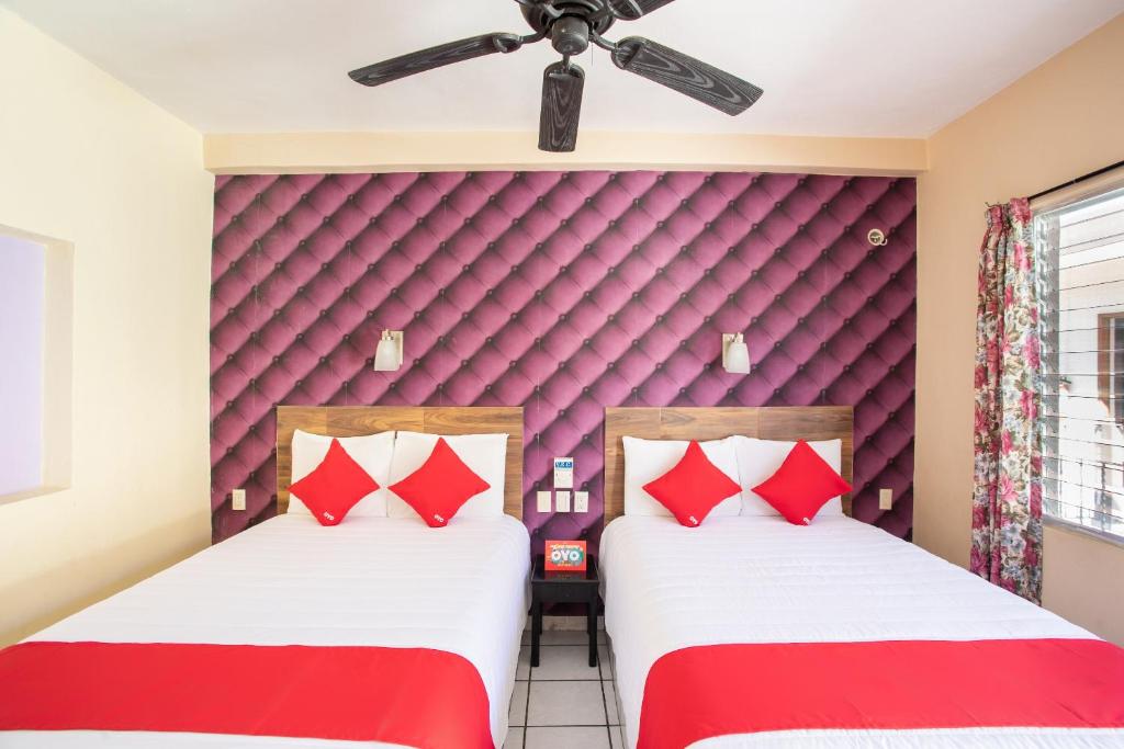 Postel nebo postele na pokoji v ubytování Hotel Costa Azul