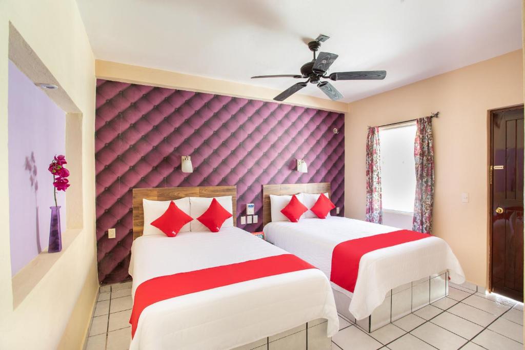 Postel nebo postele na pokoji v ubytování Hotel Costa Azul