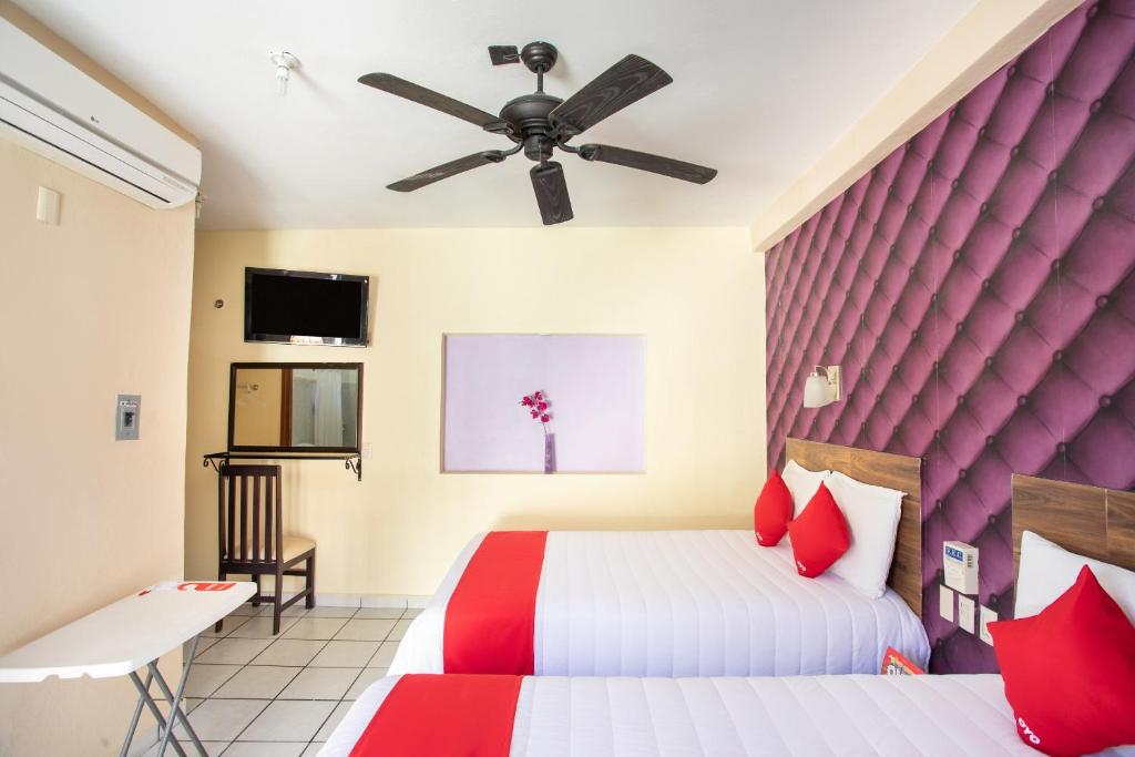 Postel nebo postele na pokoji v ubytování Hotel Costa Azul