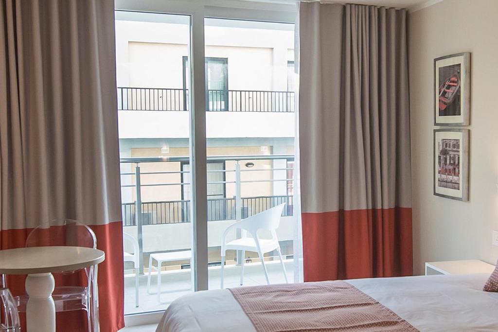 Postel nebo postele na pokoji v ubytování Seaview Hotel - Adults Only 16 Plus