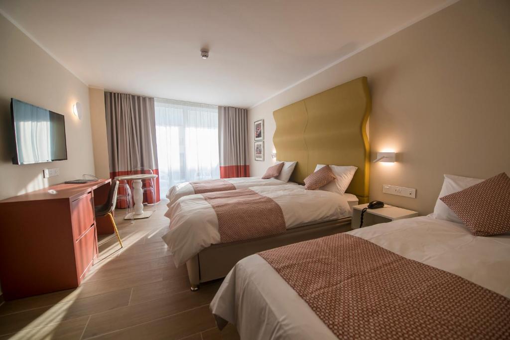 Postel nebo postele na pokoji v ubytování Seaview Hotel - Adults Only 16 Plus
