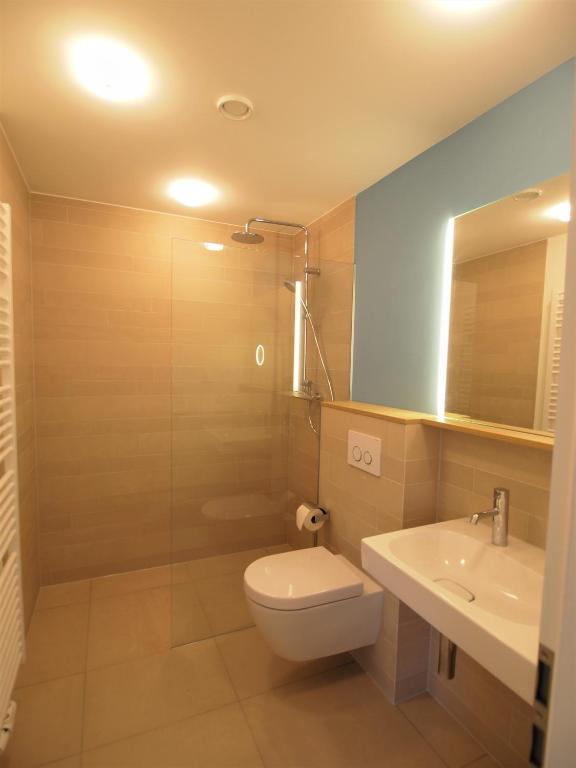 Koupelna v ubytování Hotel Gude