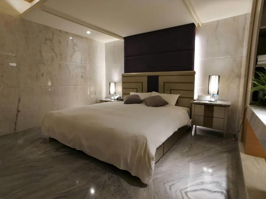 Postel nebo postele na pokoji v ubytování Michelle hotel