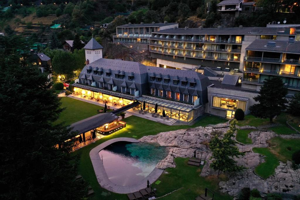 an aerial view of a resort with a large building at Andorra Park Hotel in Andorra la Vella