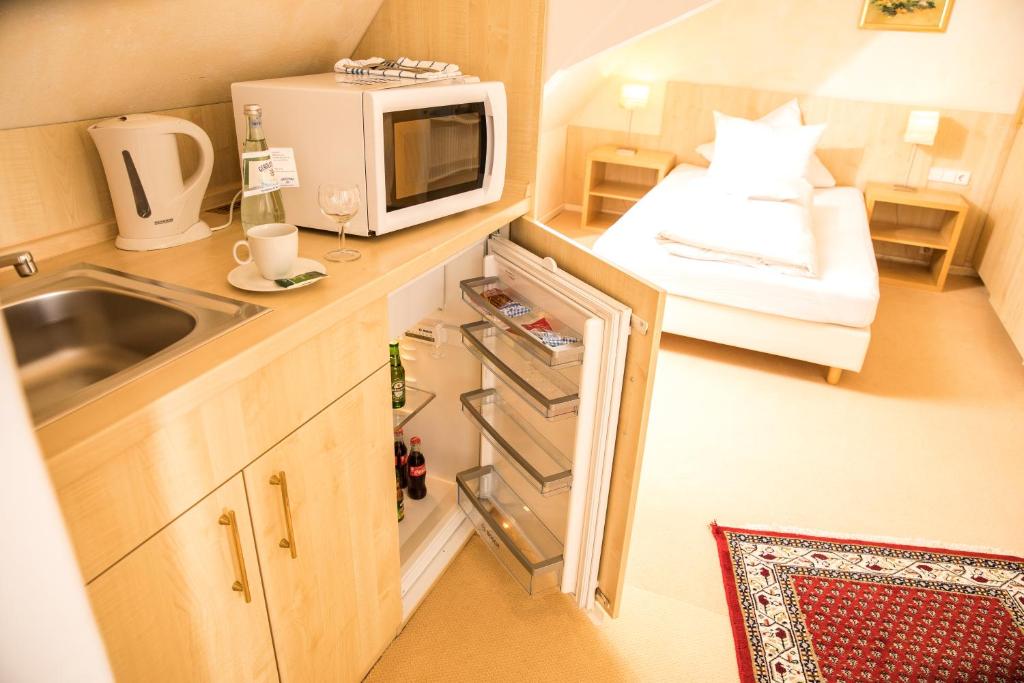 Küche/Küchenzeile in der Unterkunft airhotel ROYAL