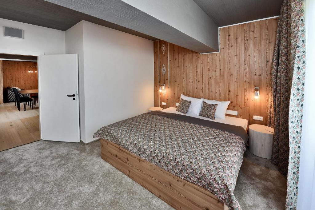 Postel nebo postele na pokoji v ubytování Apartmány Tri sestry Jasná