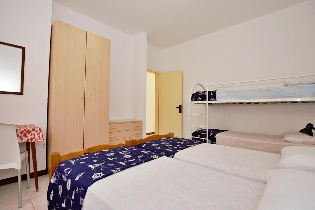 Postel nebo postele na pokoji v ubytování Residenza Valcris