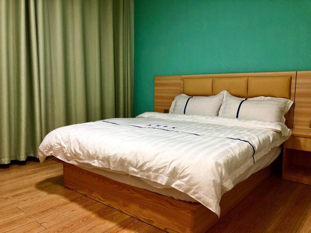 Postel nebo postele na pokoji v ubytování Li Jie Coffee Homestay