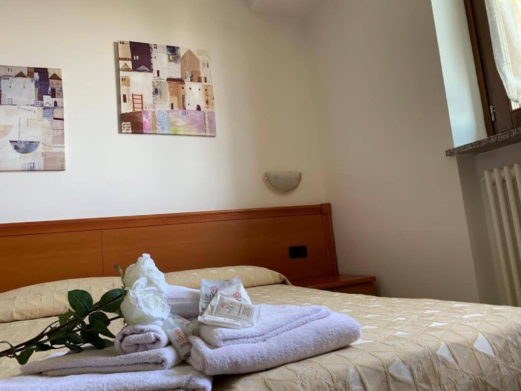 Postel nebo postele na pokoji v ubytování Casa Vacanze Orchidea