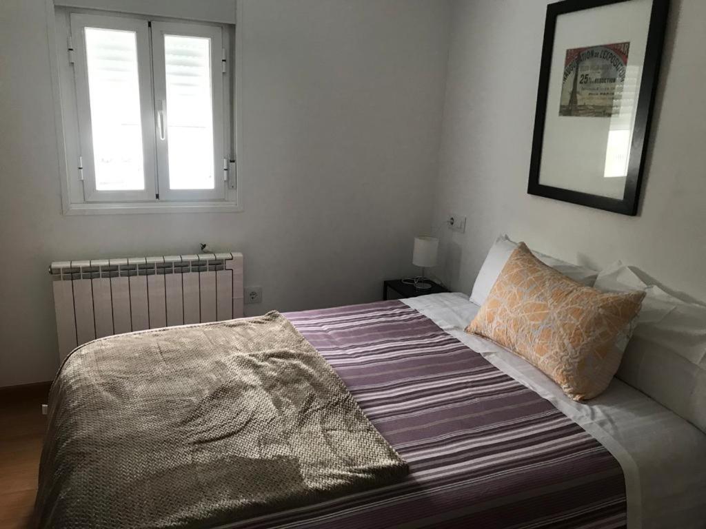 Postel nebo postele na pokoji v ubytování Polvorín