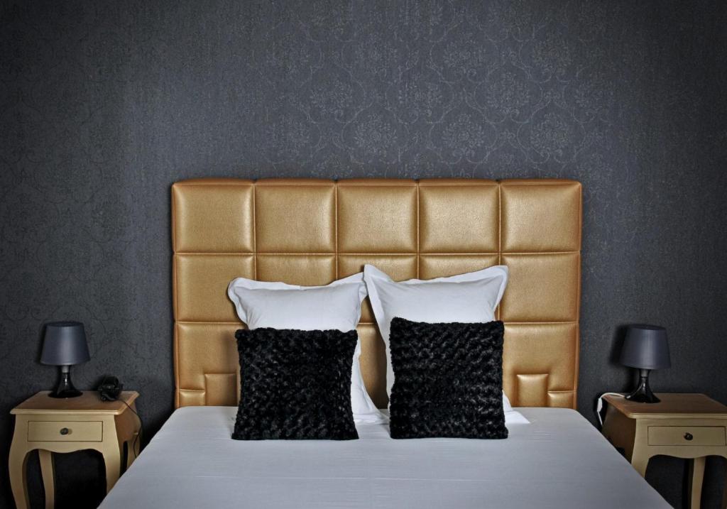 Postel nebo postele na pokoji v ubytování V E R O N E - Rooms & Suites - Liège - Rocourt