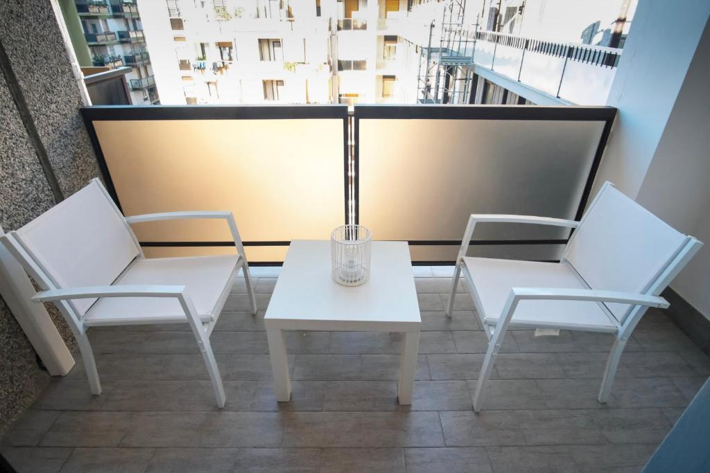 Balkon lub taras w obiekcie Rossani Suites&Aparts
