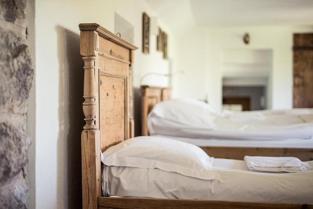 Postel nebo postele na pokoji v ubytování Hotel Alpenflora