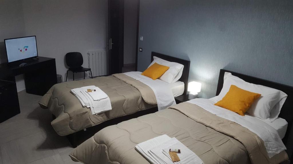 Idilliaco inn - Tweepersoonskamer Met 2 Aparte Bedden