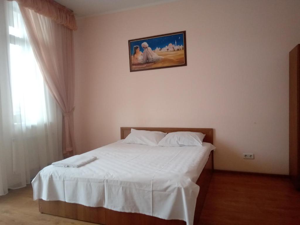 Postel nebo postele na pokoji v ubytování Мотель Карман