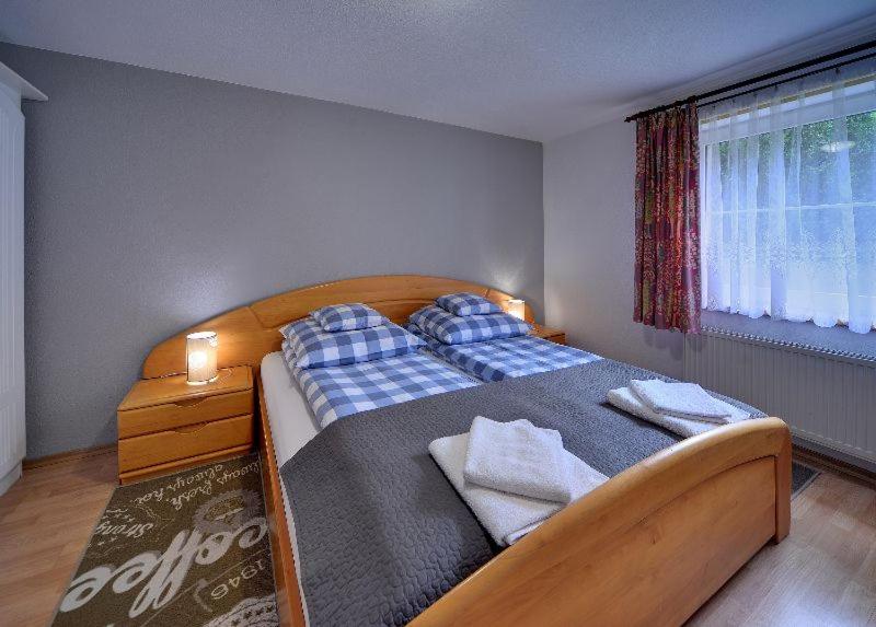 Posteľ alebo postele v izbe v ubytovaní ApartamentVanessa