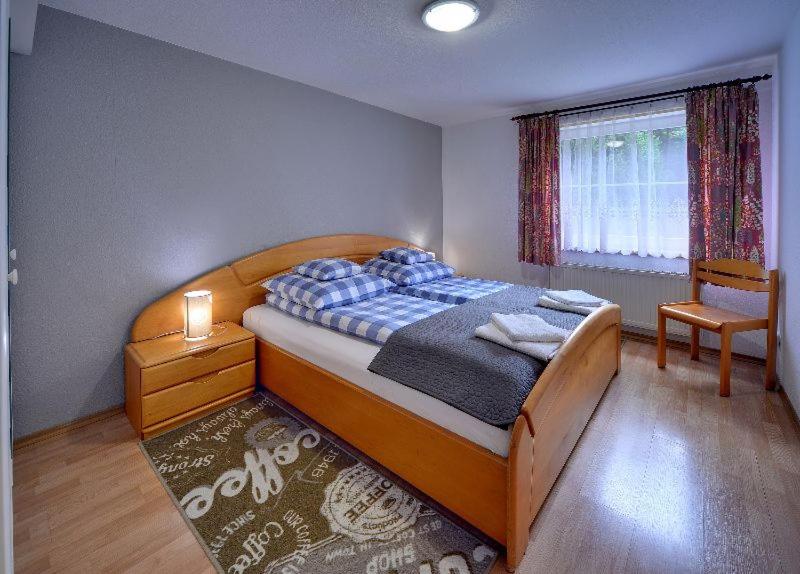 Posteľ alebo postele v izbe v ubytovaní ApartamentVanessa