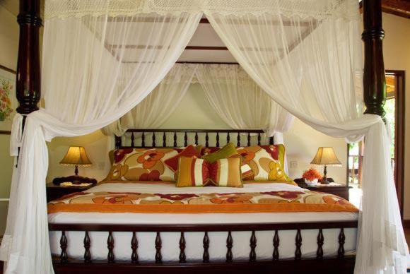 Postel nebo postele na pokoji v ubytování Spring Hotel Bequia