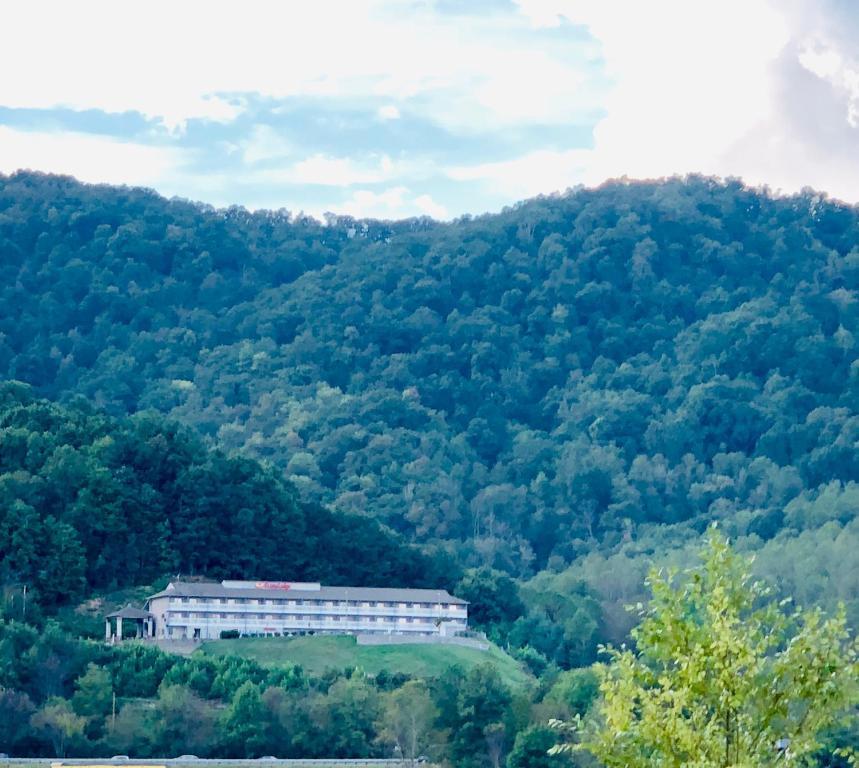 a large building in the middle of a mountain at Econo Lodge - Waynesville in Waynesville