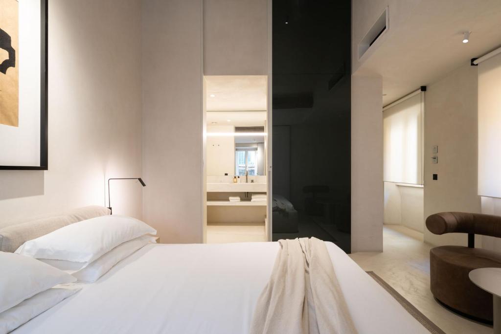 Postel nebo postele na pokoji v ubytování Hotel Scenario