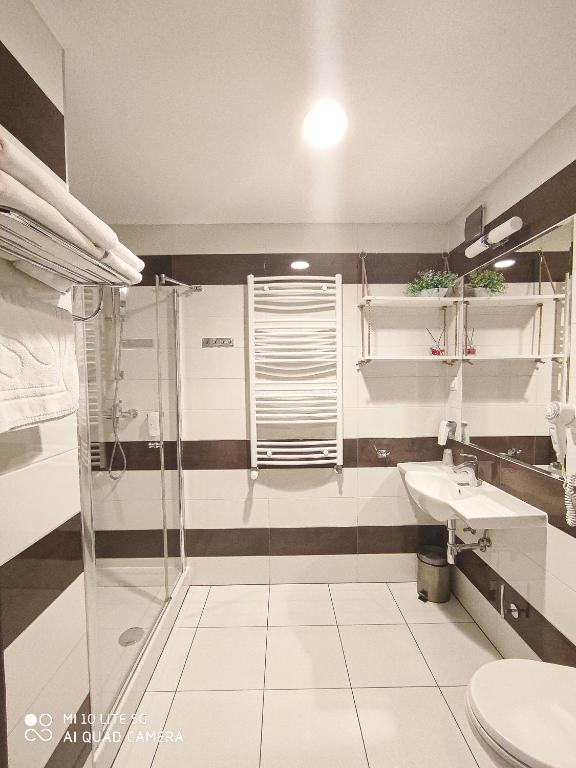 Koupelna v ubytování Hotel Milenium
